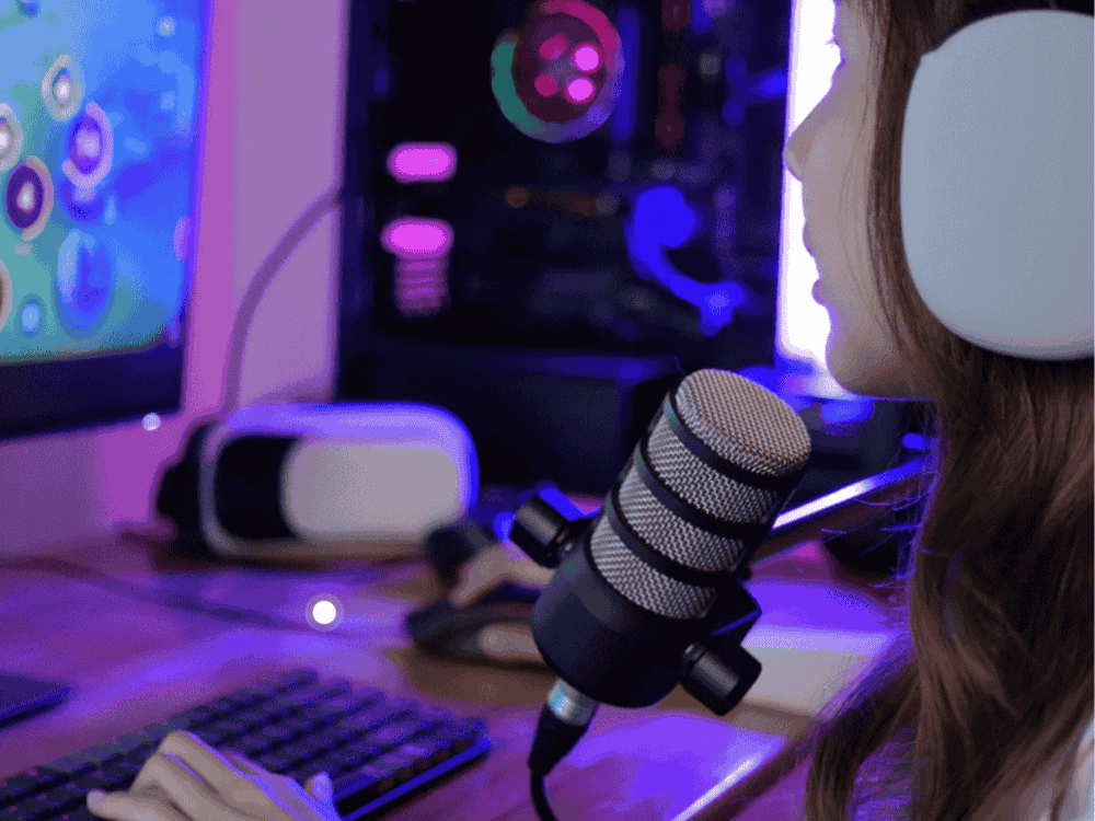 A lady game streamer using a condenser microphone