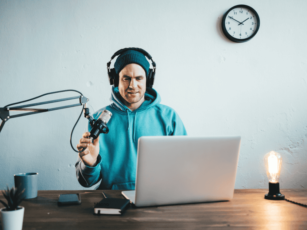 A man live streaming using a reliable streaming microphone