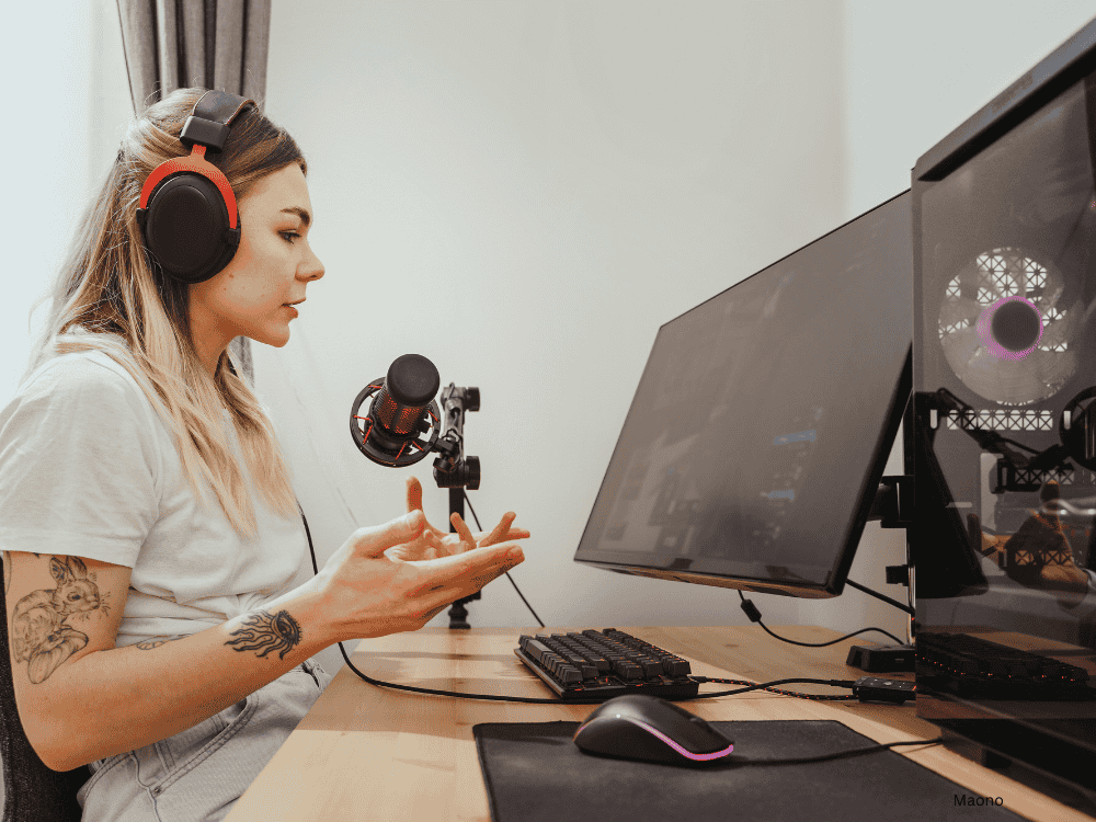 A girl live streaming using a streaming microphone