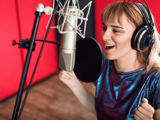 A lady singing in studio with a cardioid pattern microphone