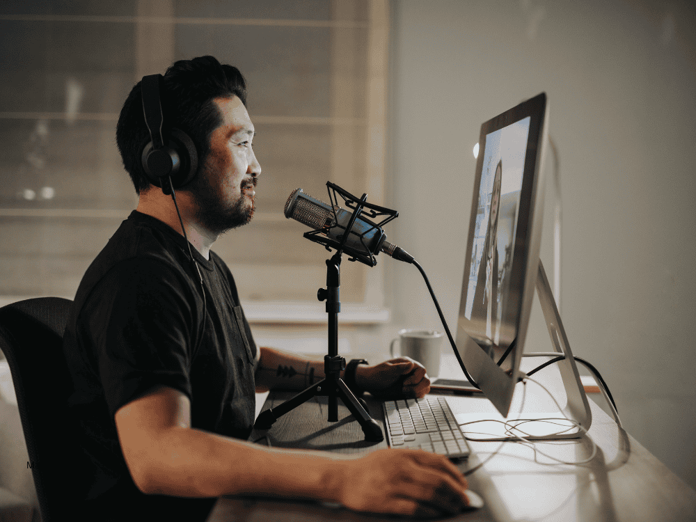 a man using a conference microphone on a video call