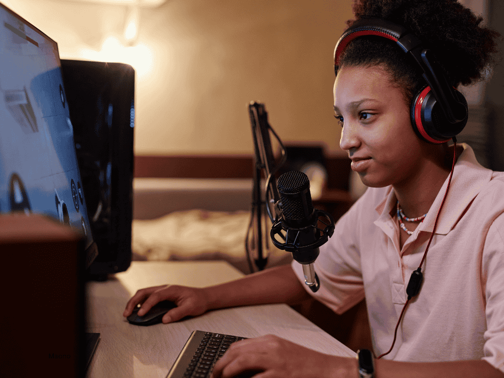 A female gamer using a cardioid pattern microphones for streaming