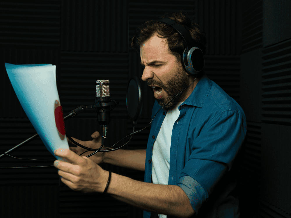 A voice actor using an XLR microphone for voice project