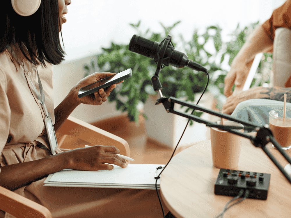 A female content creator using a podcast kit for her channel