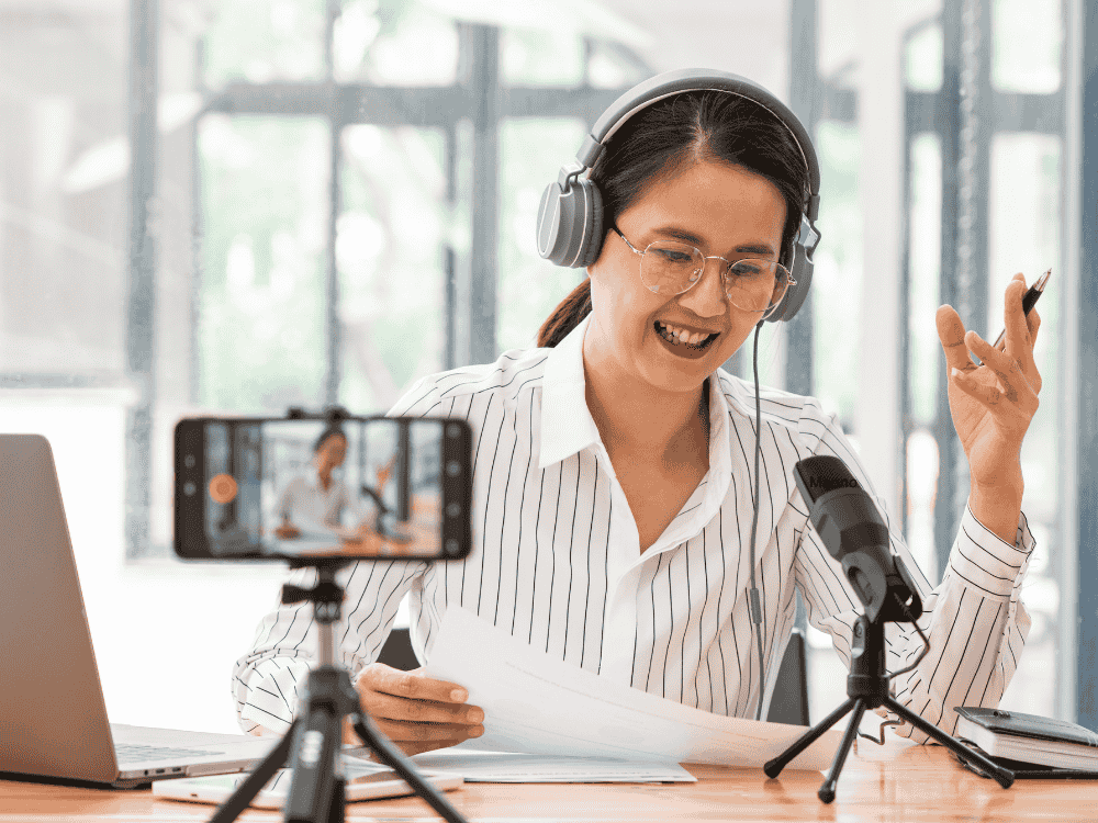 A lady using a condenser microphone for remote work