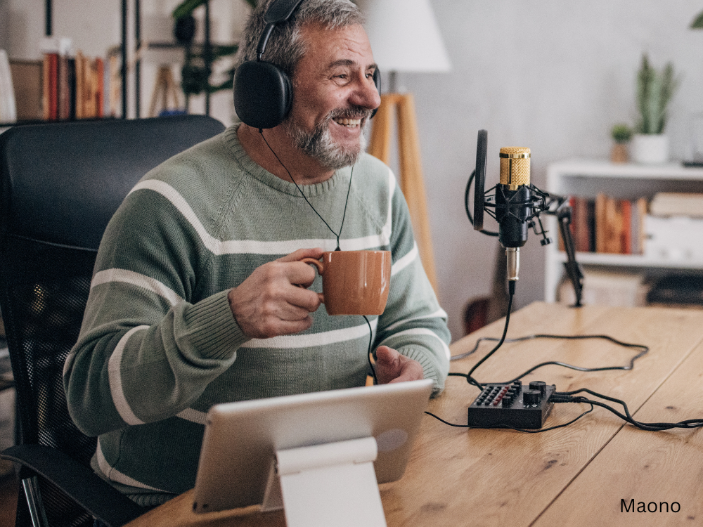 a male podcasting using an audio interface