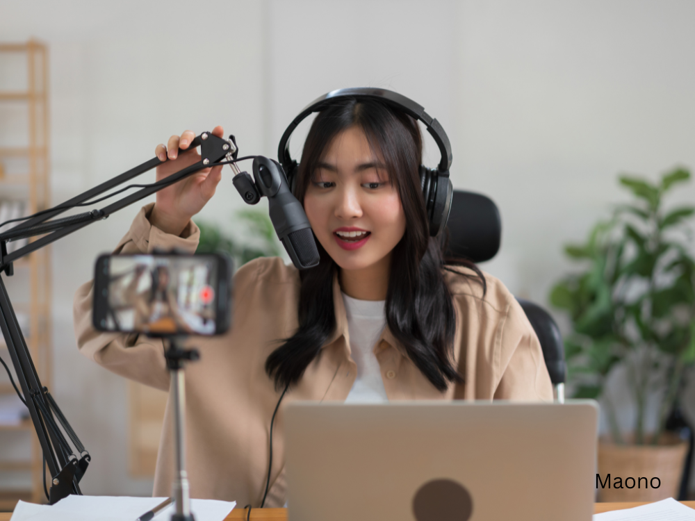 female podcasting using a USB microphone