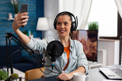 lady podcasting using a dynamic microphone