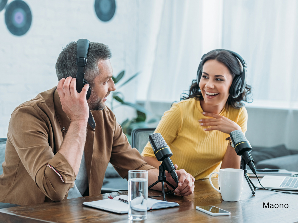 male and female podcasting in a studio