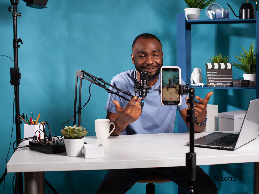 male live streaming using a mic and a boom arm