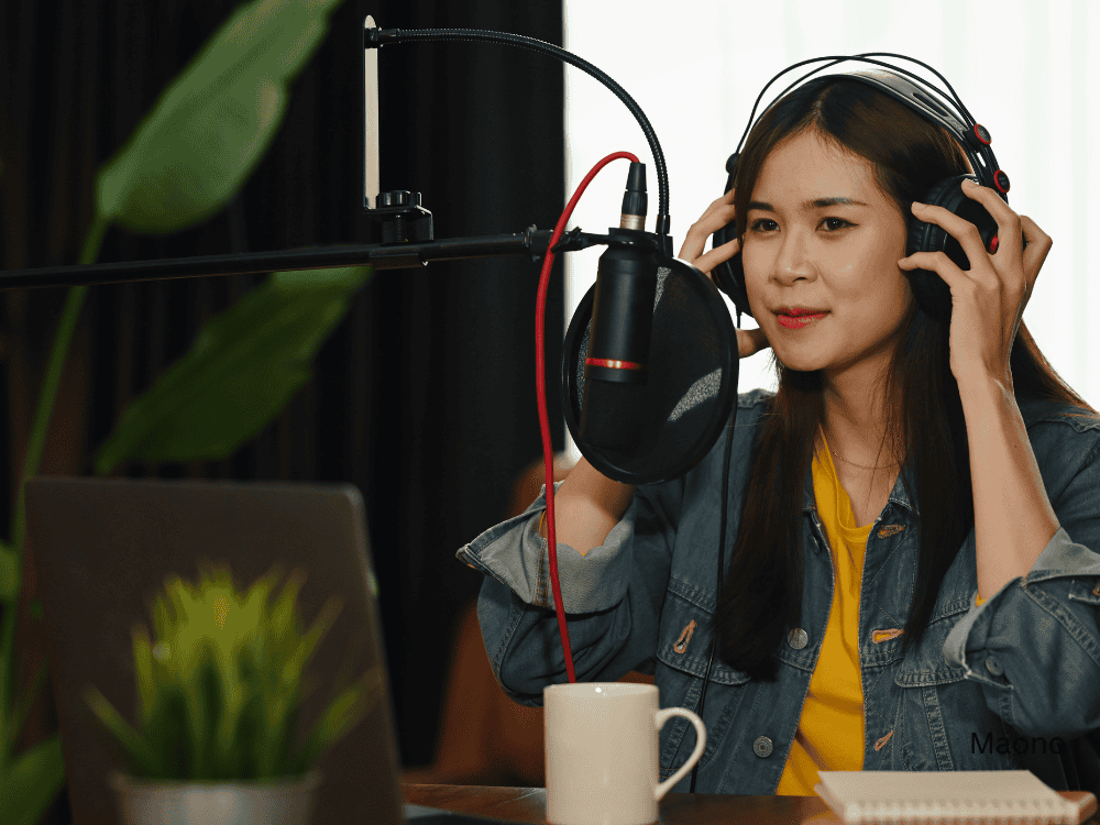 woman podcasting using a condenser microphone