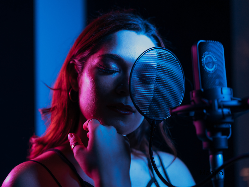 woman singing with USB condenser microphone